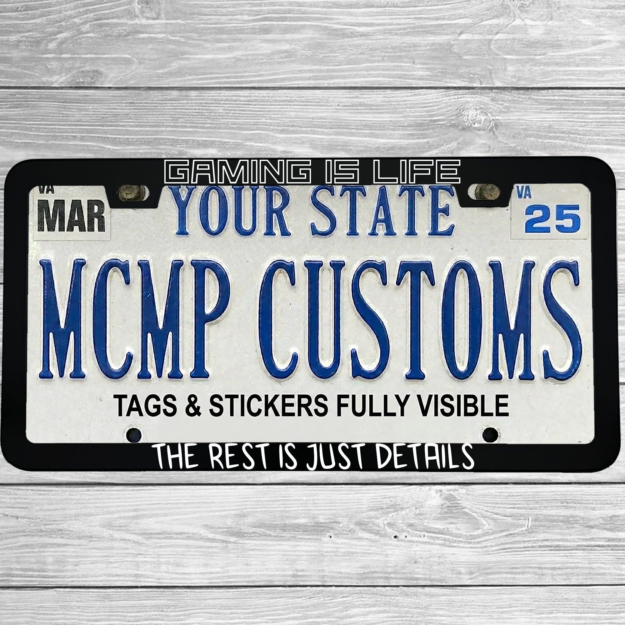 "Gaming Is Life The Rest Is Just Details" license plate frame shown on vehicle — lifestyle photo