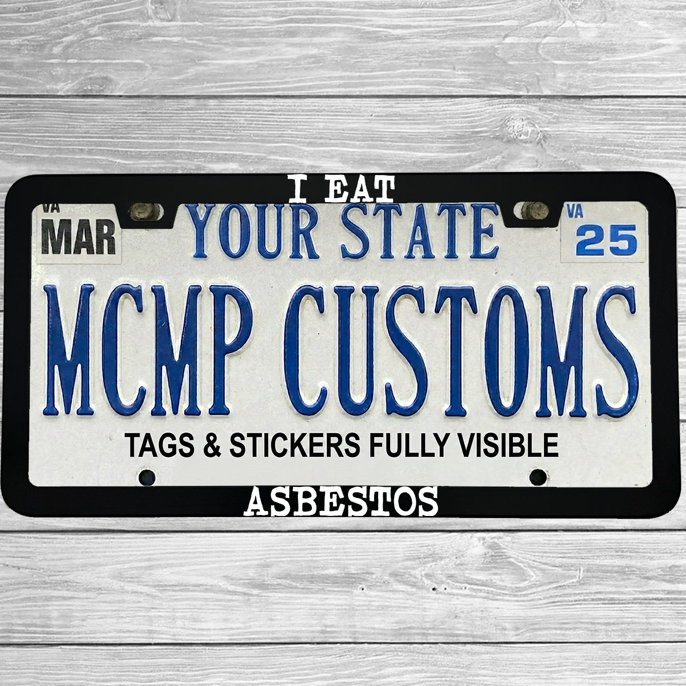 "I Eat Asbestos" license plate frame shown on vehicle β lifestyle photo
