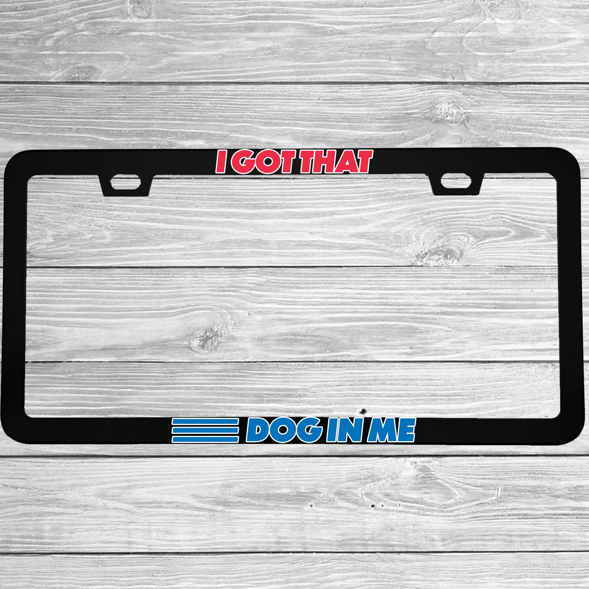 Close-up of "I Got That Dog In Me Funny Hot Dog Classic" license plate frame showing fade-proof print quality