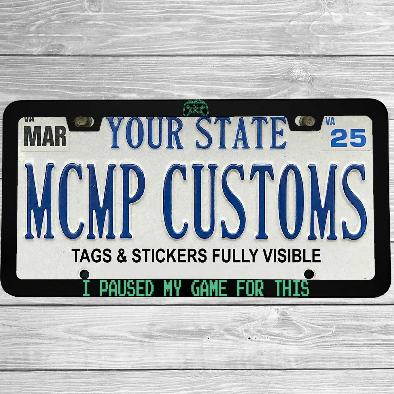 "I Paused My Game For This" license plate frame shown on vehicle — lifestyle photo