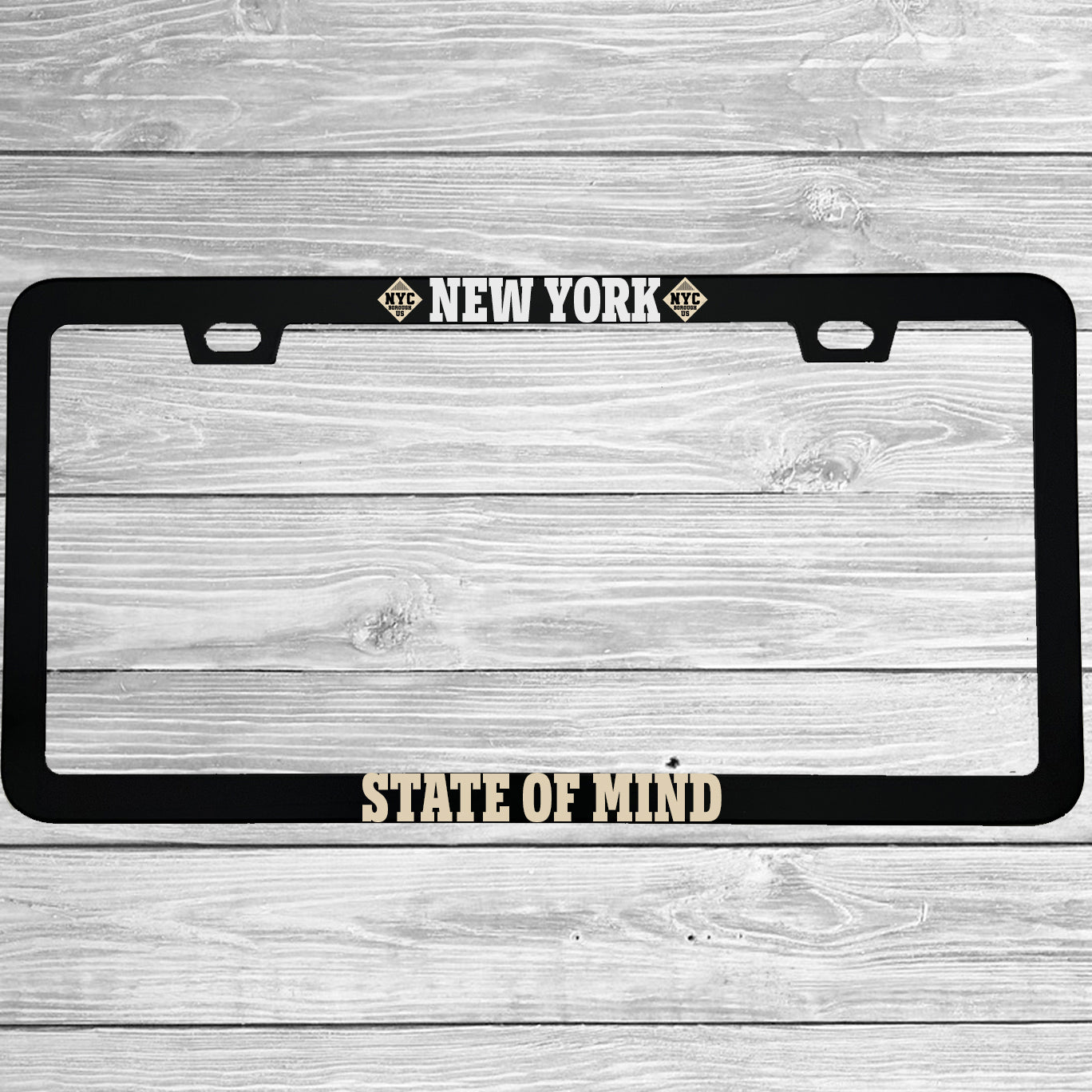 Close-up of "New York State of Mind" license plate frame showing fade-proof print quality
