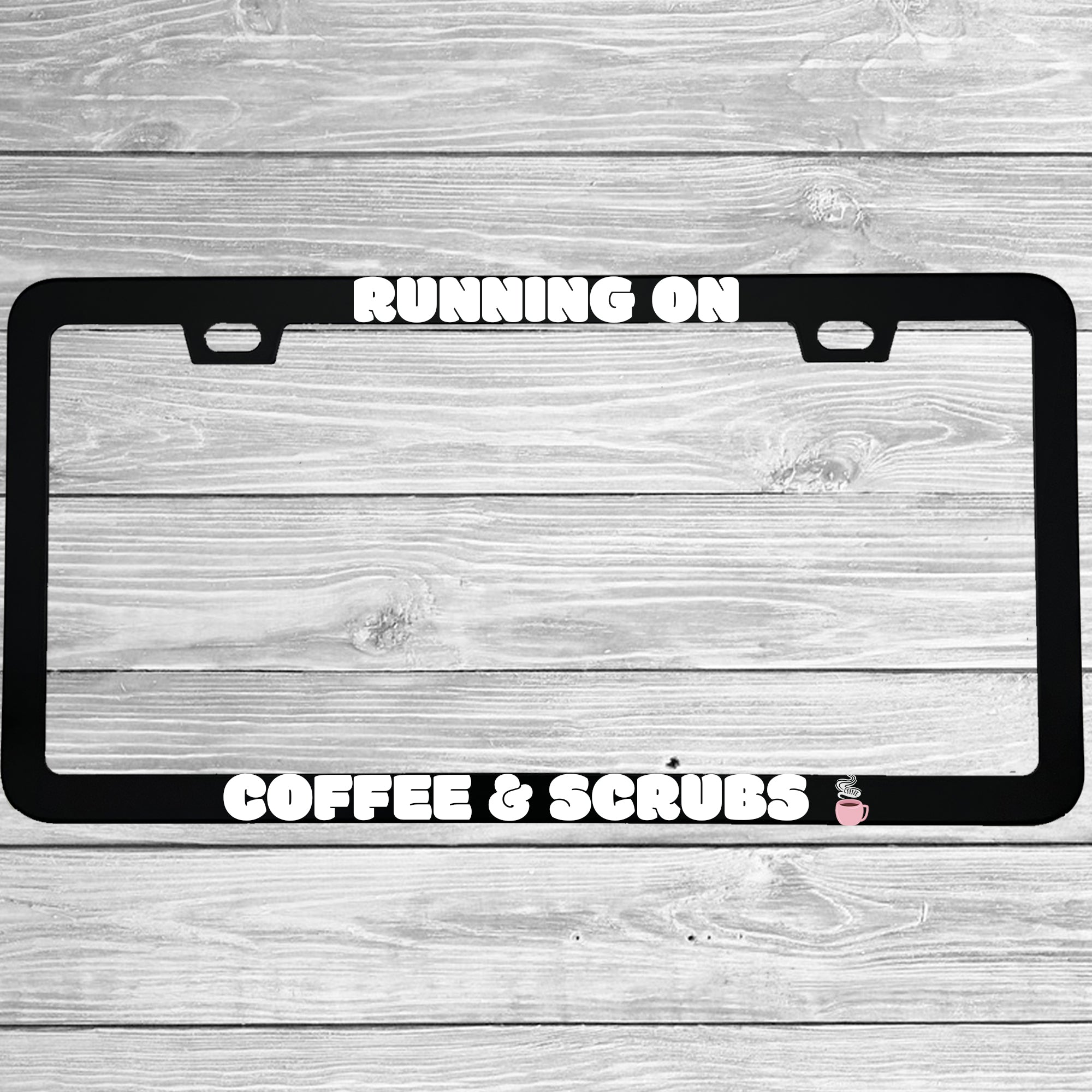 Close-up of "Running on Coffee and Scrubs" license plate frame showing fade-proof print quality