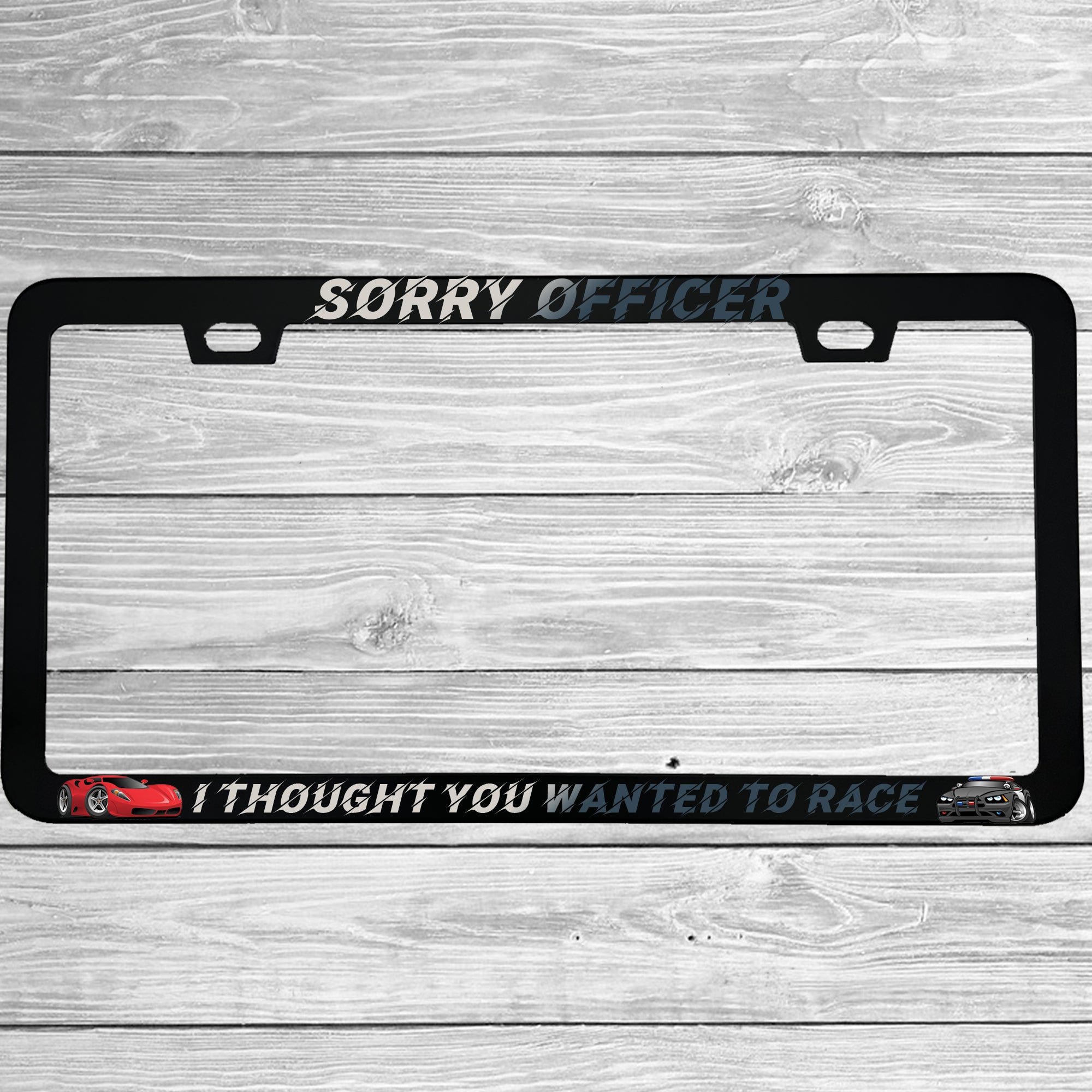 Close-up of "Sorry Officer I Thought You Wanted To Race" license plate frame showing fade-proof print quality