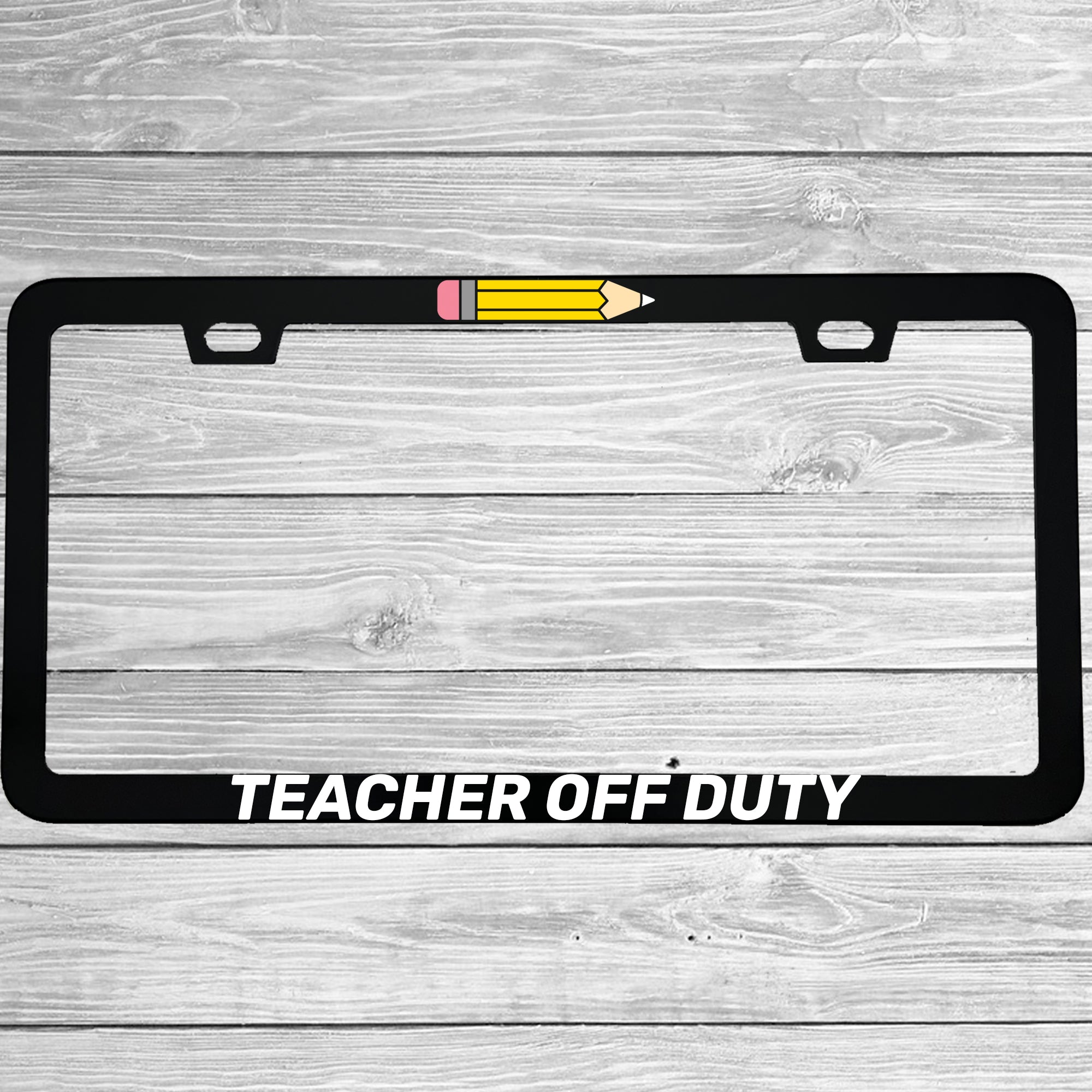 Close-up of "Teacher Off Duty" license plate frame showing fade-proof print quality