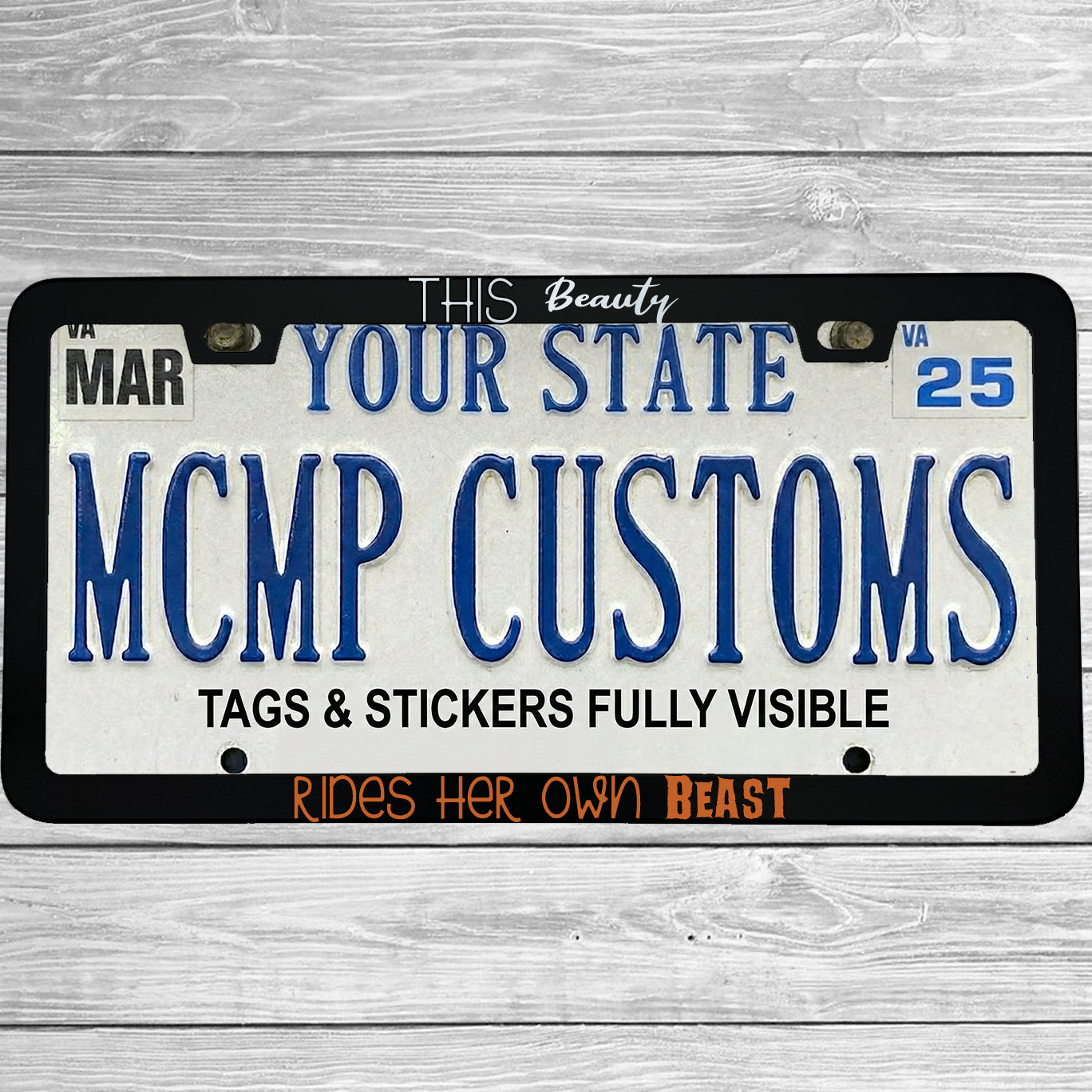 "This Beauty Rides Her Own Beast" license plate frame shown on vehicle β lifestyle photo