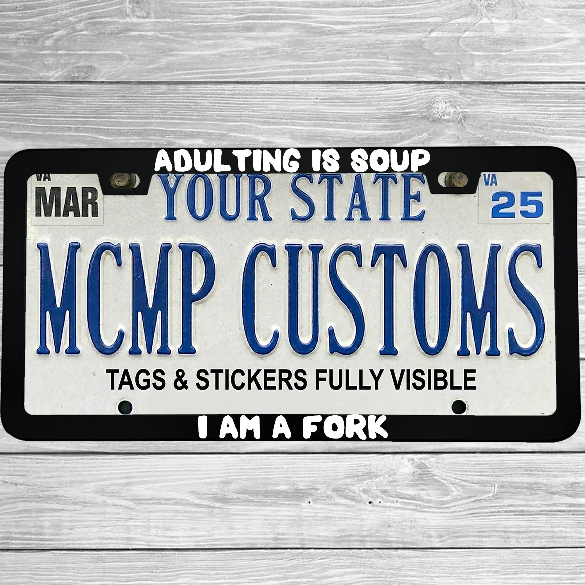 "Adulting Is Soup, I Am A Fork" license plate frame shown on vehicle β lifestyle photo