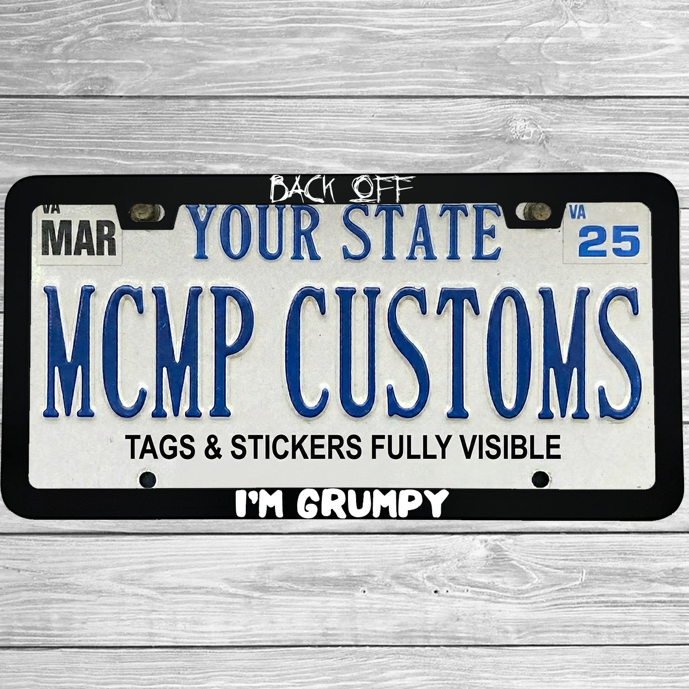 "Back Off I'm Grumpy" license plate frame shown on vehicle β lifestyle photo