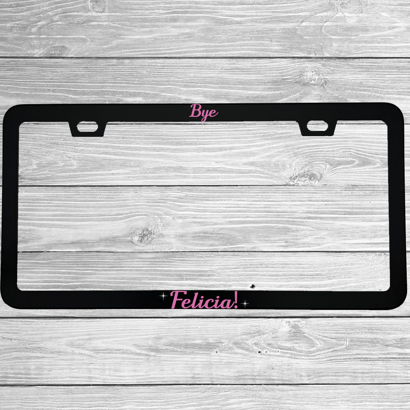 Close-up of "Bye Felicia" license plate frame showing fade-proof print quality