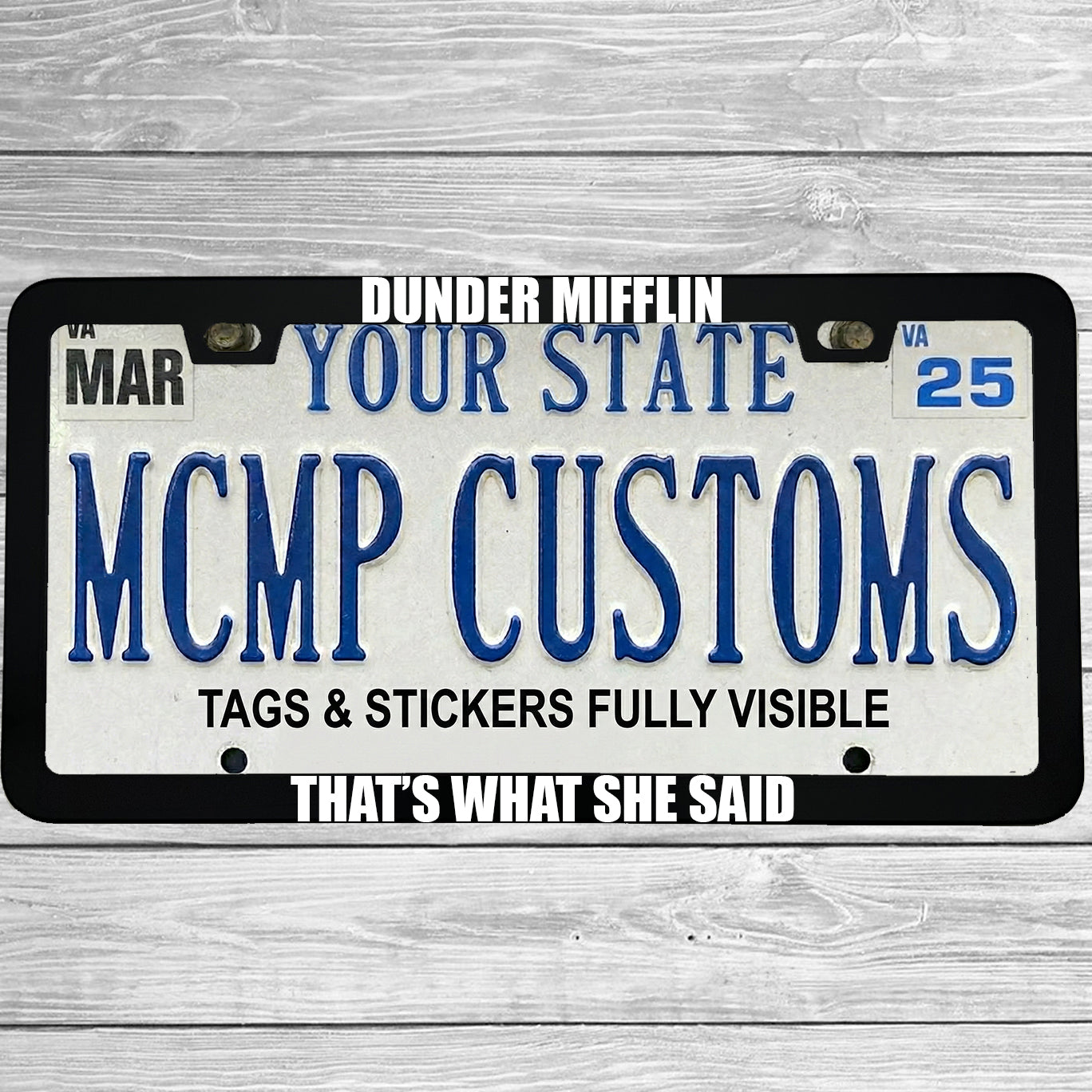"Dunder Mifflin That's What She Said" license plate frame shown on vehicle β lifestyle photo