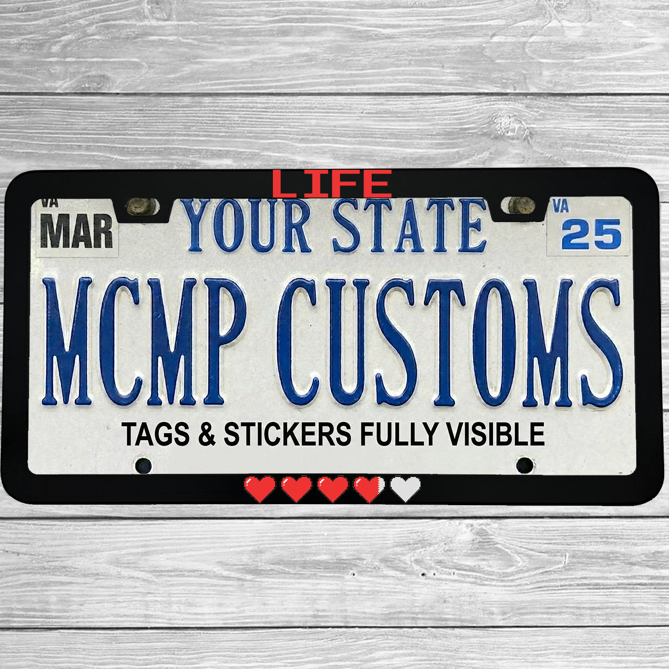 "Life Pixel Hearts" license plate frame shown on vehicle — lifestyle photo