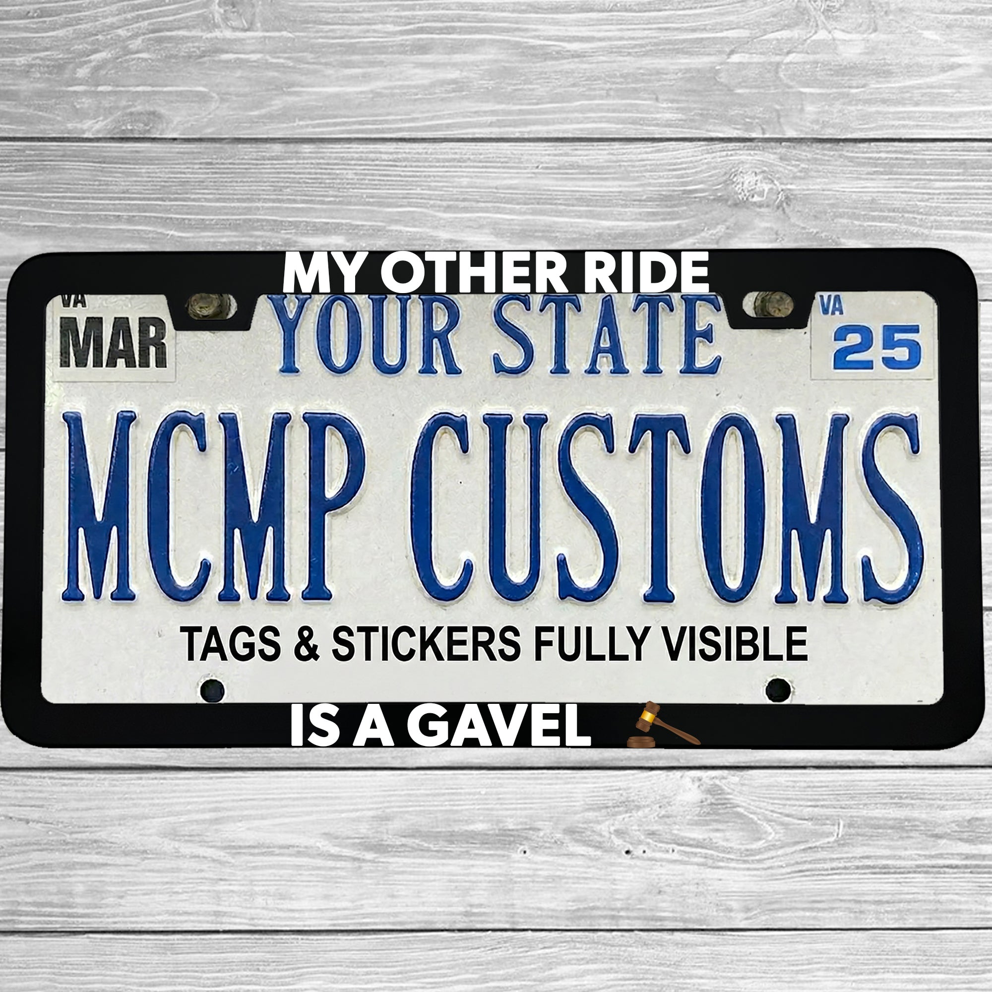 "My Other Car Is A Gavel" license plate frame shown on vehicle — lifestyle photo