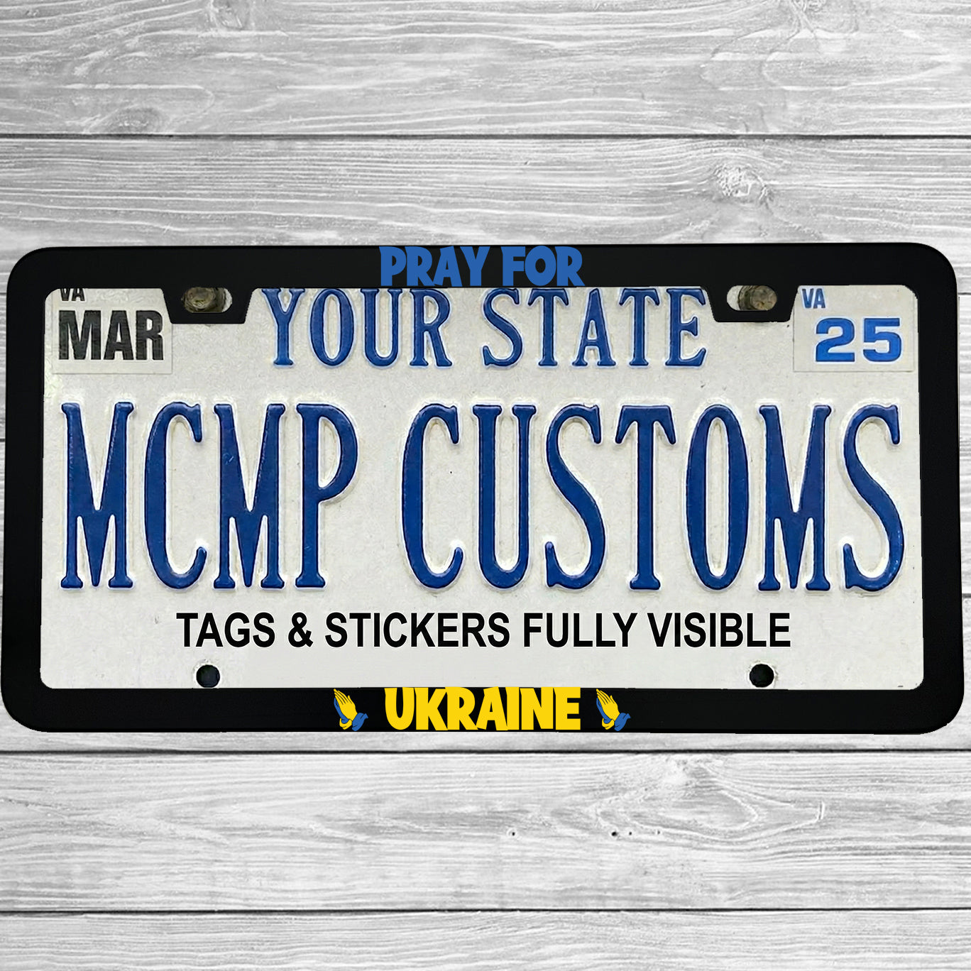 "Pray For Ukraine" license plate frame shown on vehicle β lifestyle photo