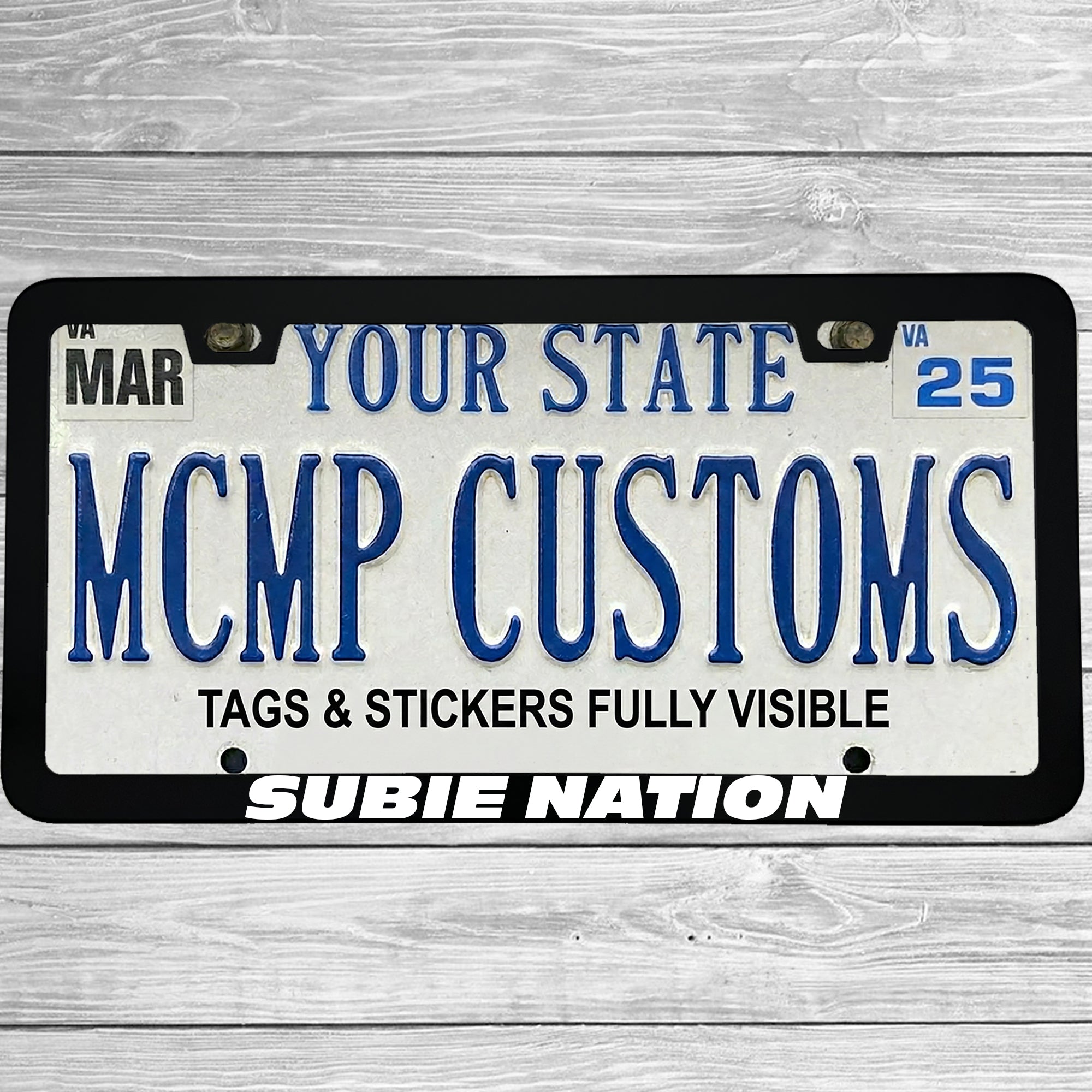 "Subie Nation" license plate frame shown on vehicle β lifestyle photo