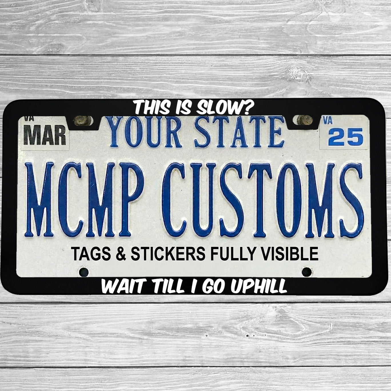 "This Is Slow Wait Till I Go Uphill" license plate frame shown on vehicle β lifestyle photo