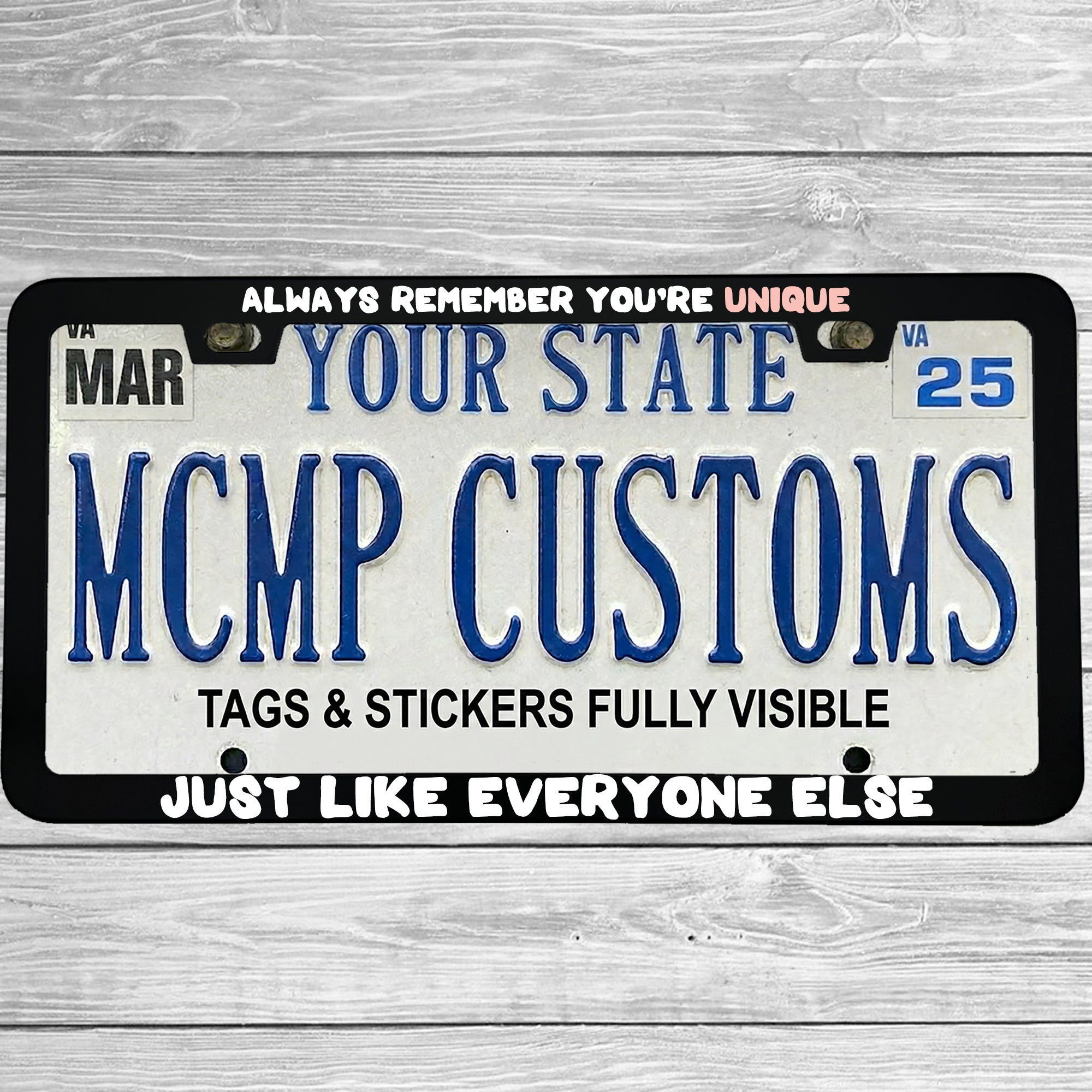 "Always Remember You're Unique Just Like Everyone Else" license plate frame shown on vehicle — lifestyle photo