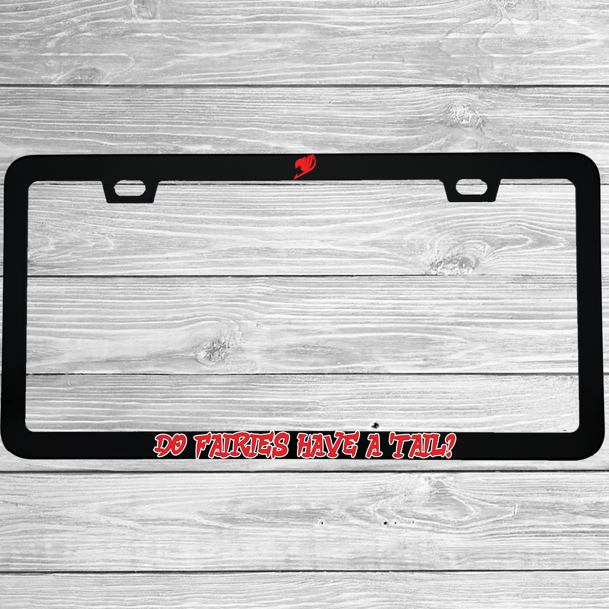 Close-up of "Do Fairies Have A Tail?" license plate frame showing fade-proof print quality
