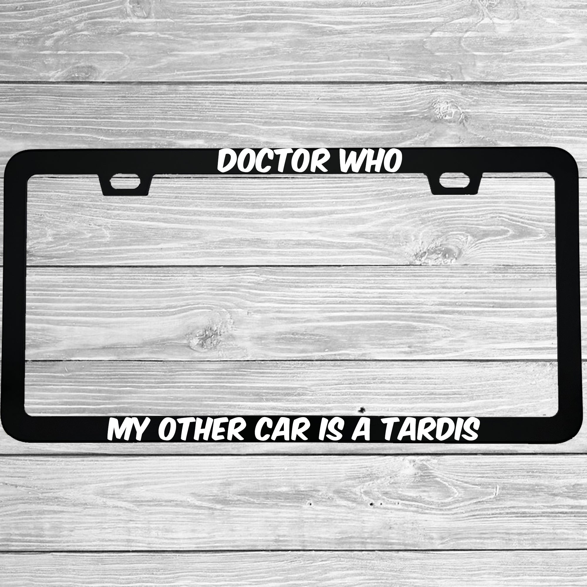 Close-up of "Doctor Who My Other Car Is A Tardis" license plate frame showing fade-proof print quality
