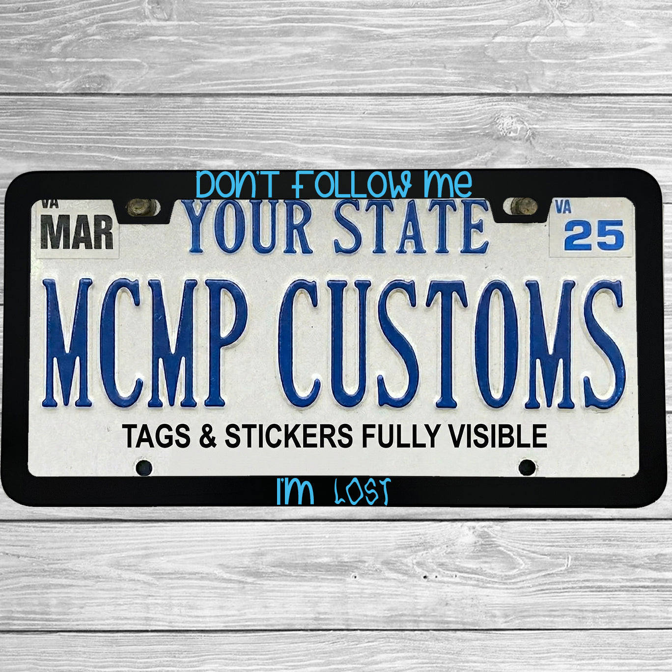 "Don't Follow Me I'm Lost" license plate frame shown on vehicle — lifestyle photo