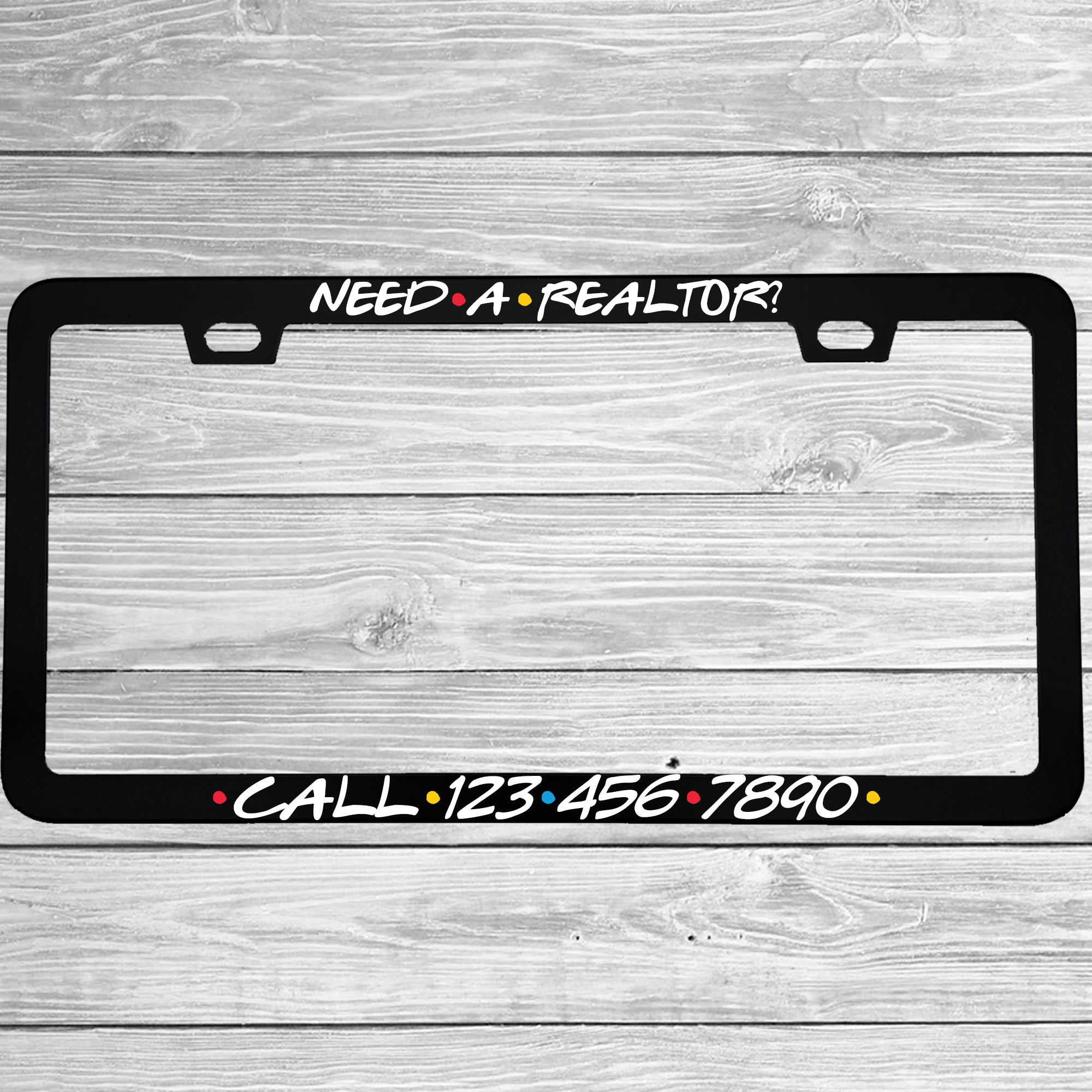 Close-up of "Custom Friends Style Themed Realtor" license plate frame showing fade-proof print quality
