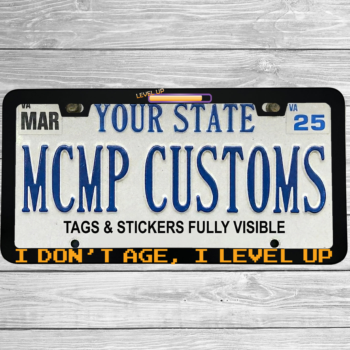 "I Dont Age I Level Up" license plate frame shown on vehicle — lifestyle photo