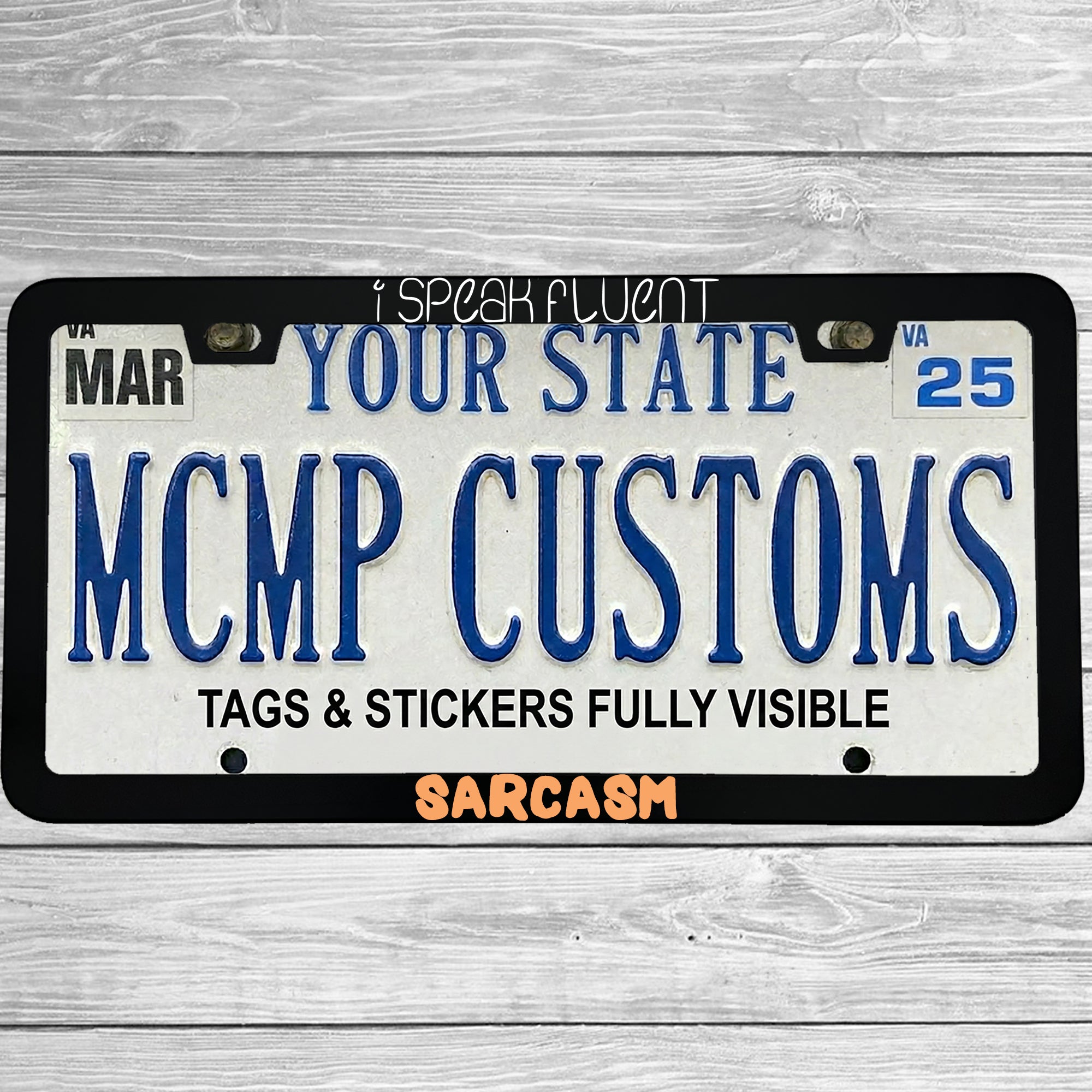 "I Speak Fluent Sarcasm" license plate frame shown on vehicle — lifestyle photo