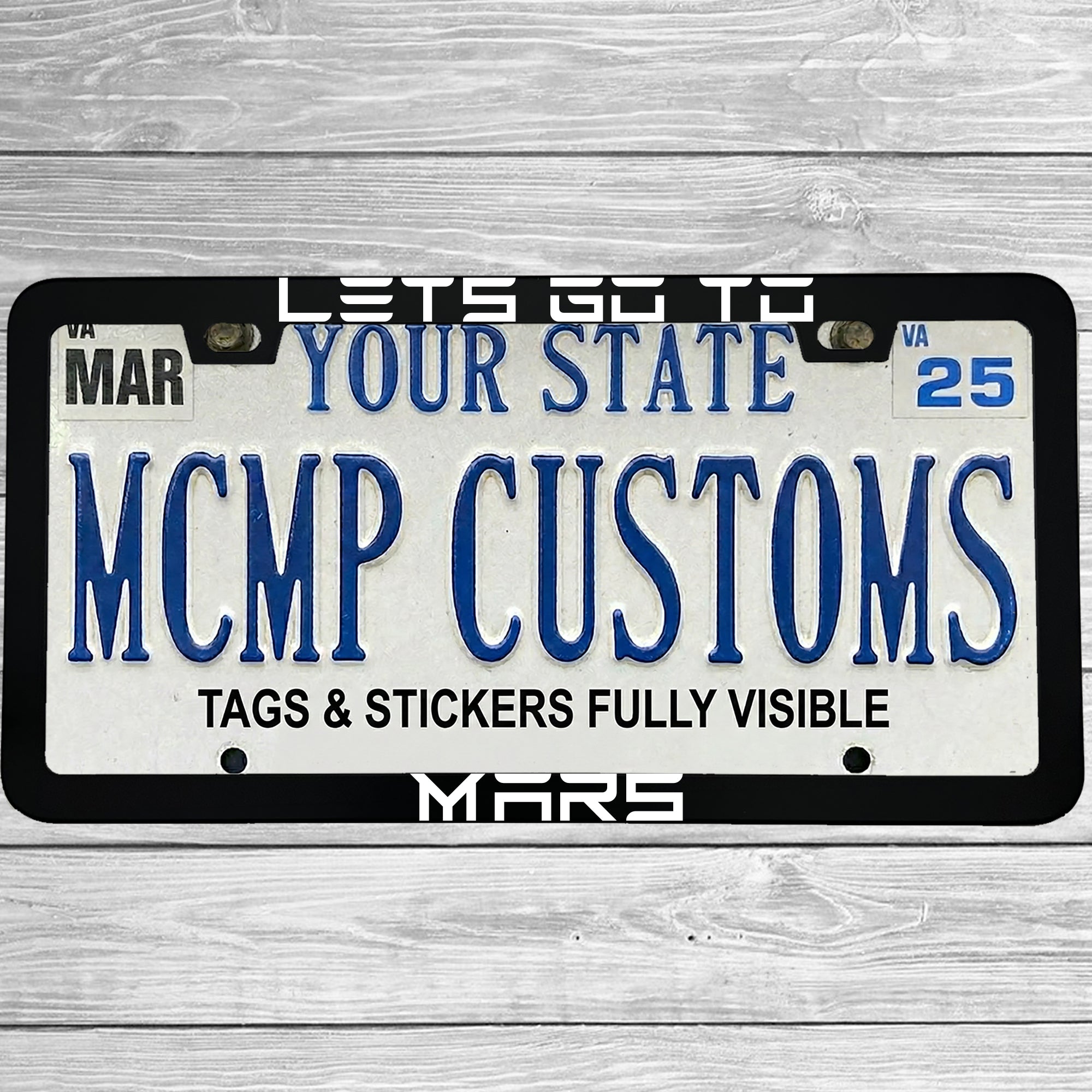 "Lets Go To Mars Funny Electric Car Outer Space" license plate frame shown on vehicle — lifestyle photo