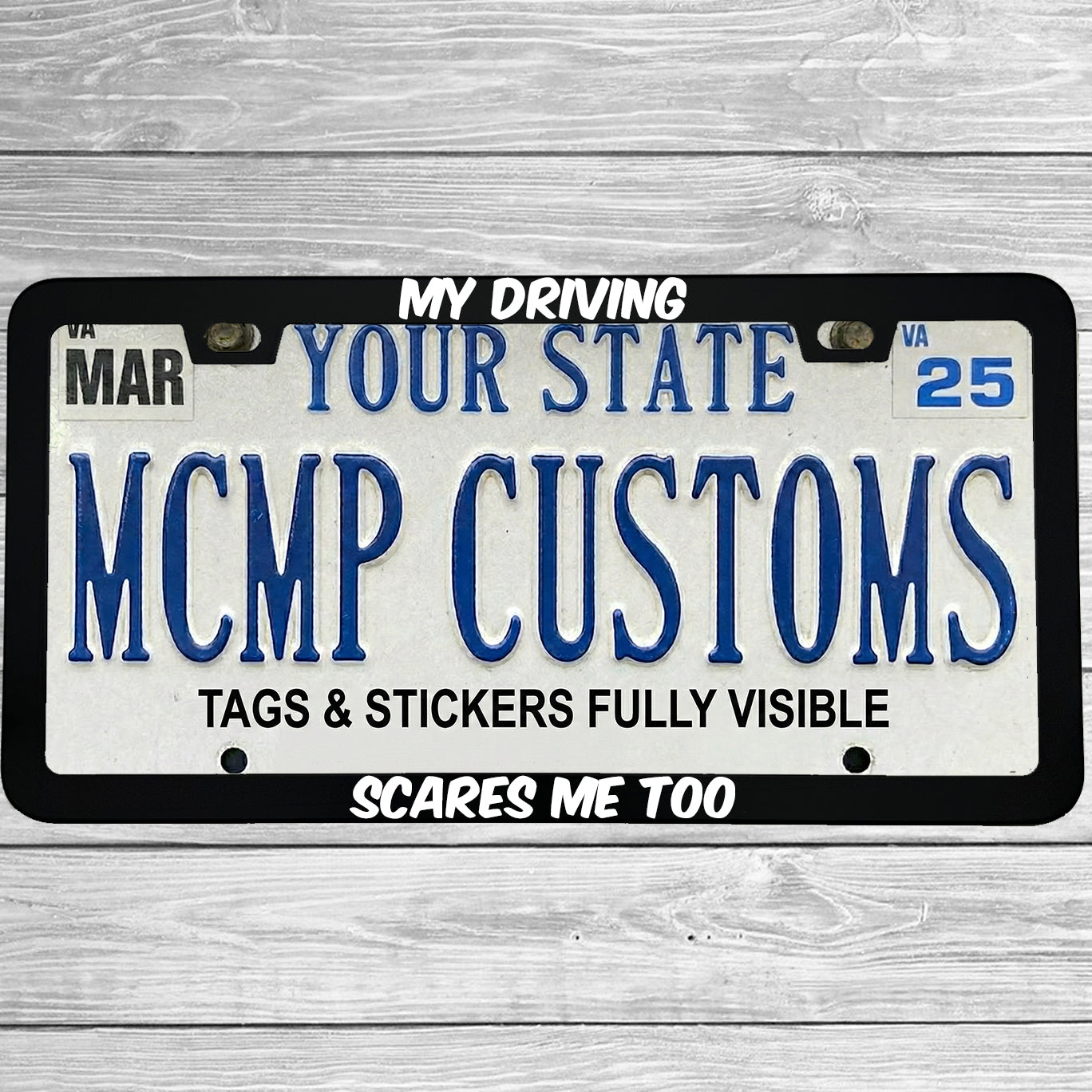 "My Driving Scares Me Too" license plate frame shown on vehicle — lifestyle photo