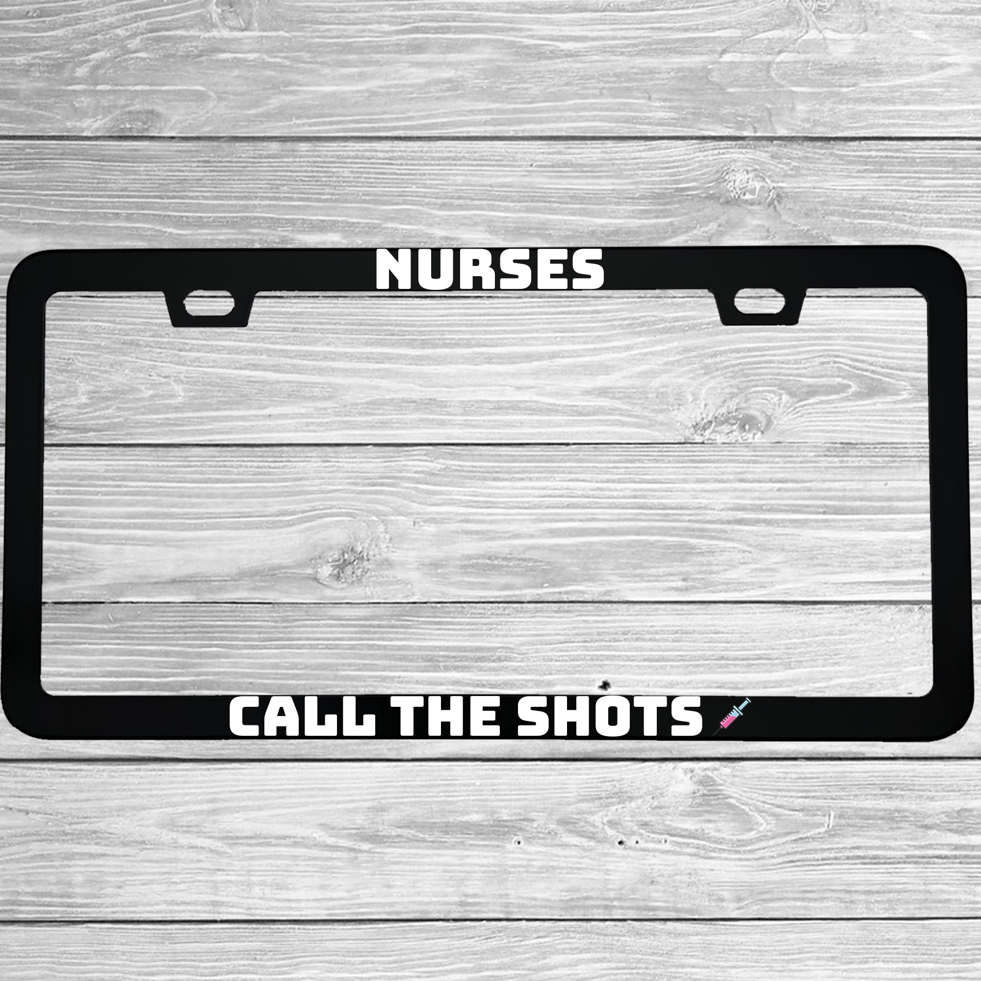 Close-up of "Nurses Call The Shots" license plate frame showing fade-proof print quality
