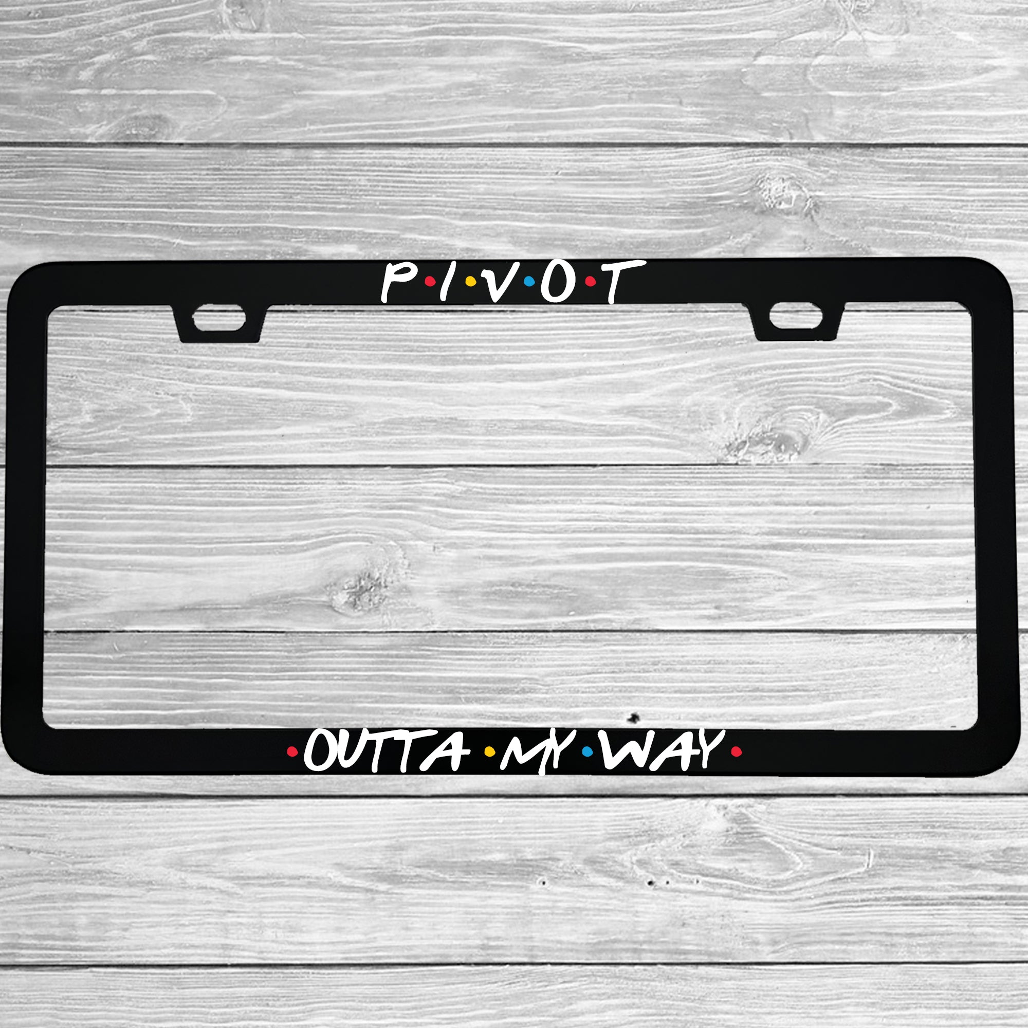 Close-up of "Pivot Outta My Way" license plate frame showing fade-proof print quality