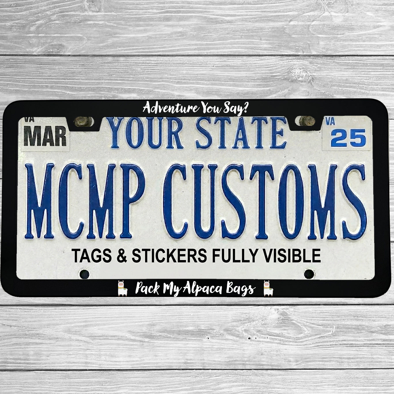 "Adventure You Say Pack My Alpaca Bags" license plate frame shown on vehicle — lifestyle photo