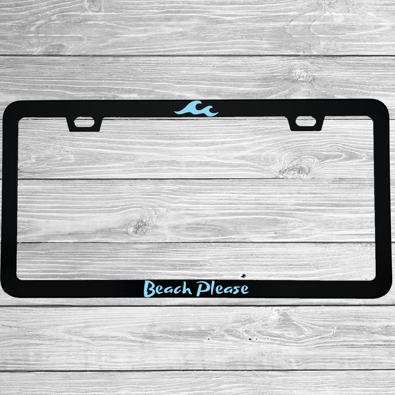 Close-up of "Beach Please" license plate frame showing fade-proof print quality