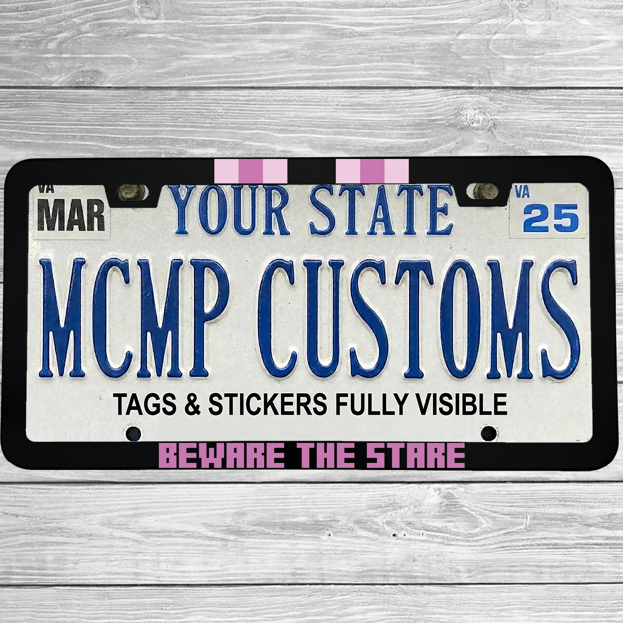 "Beware The Stare" license plate frame shown on vehicle — lifestyle photo