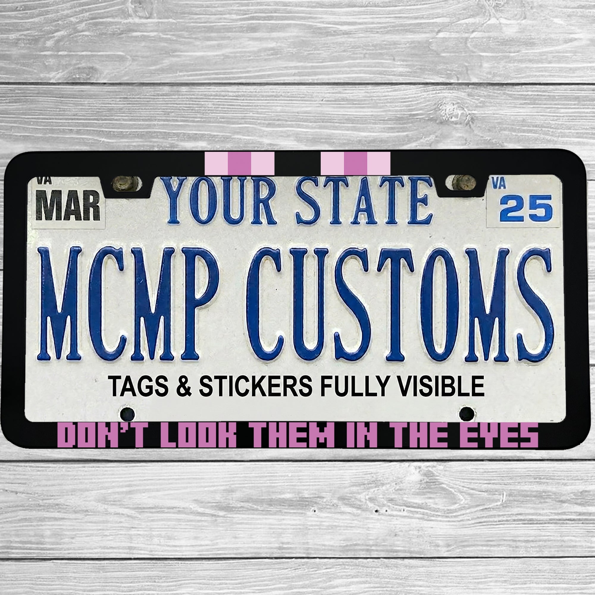 "Don't Look Them In The Eyes Minecraft Enderman" license plate frame shown on vehicle — lifestyle photo