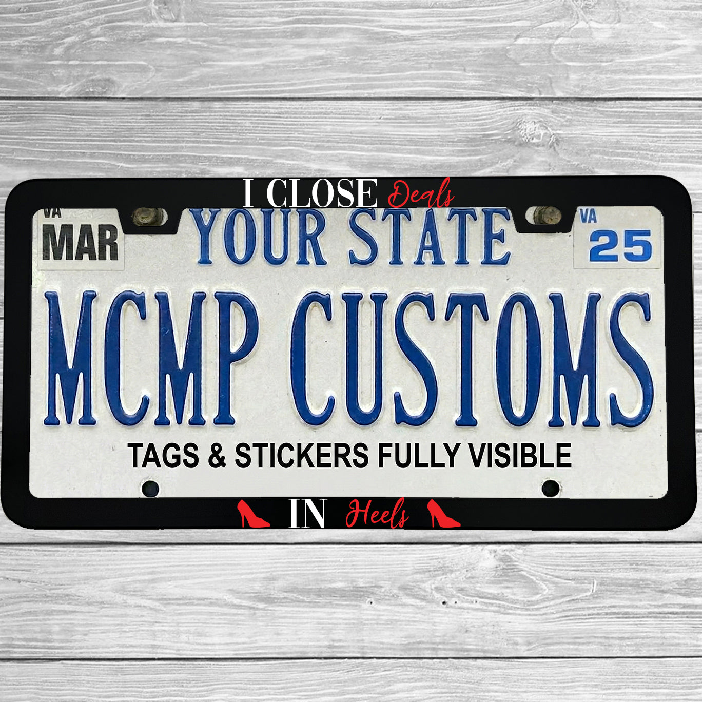 "I Close Deals In Heels" license plate frame shown on vehicle — lifestyle photo