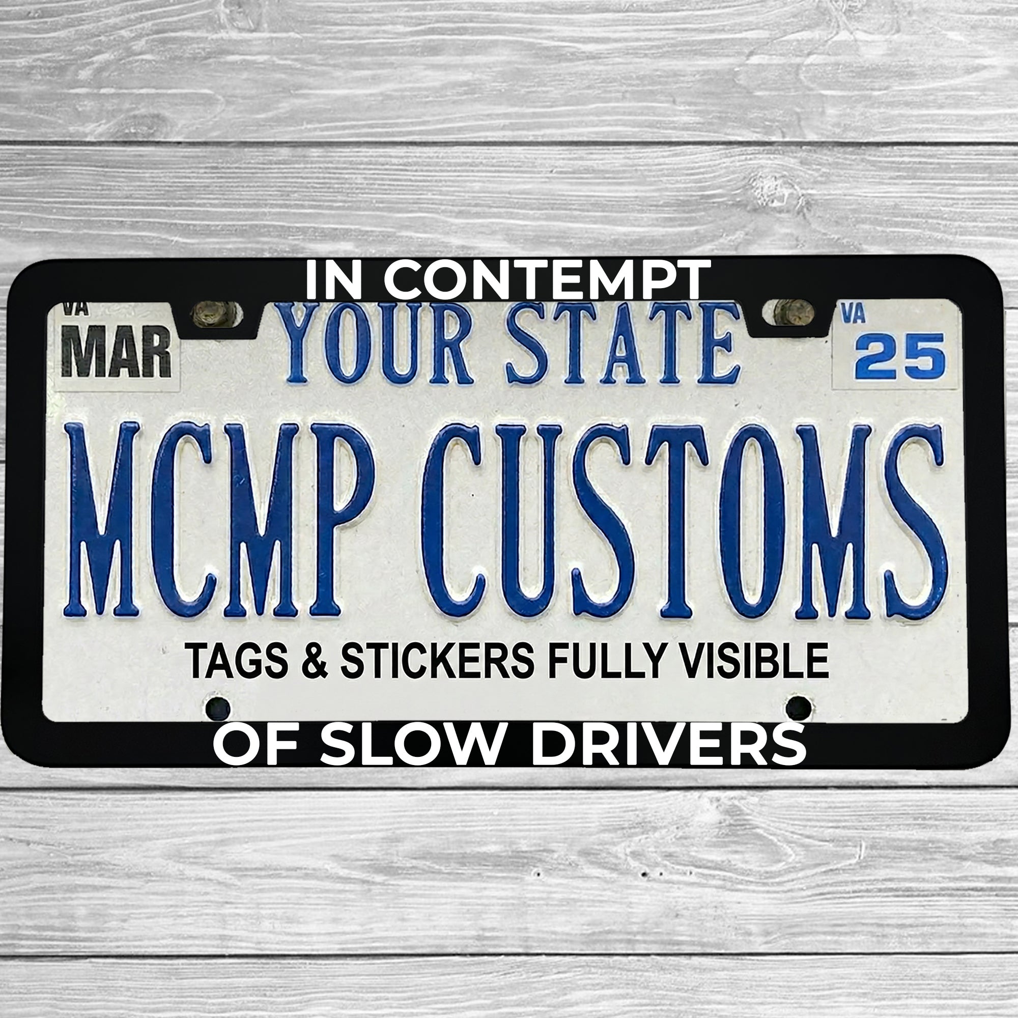 "In Contempt of Slow Drivers" license plate frame shown on vehicle — lifestyle photo