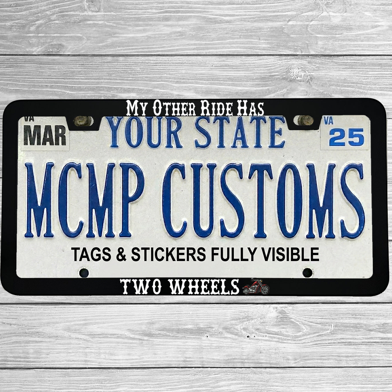 "My Other Ride Has Two Wheels" license plate frame shown on vehicle — lifestyle photo