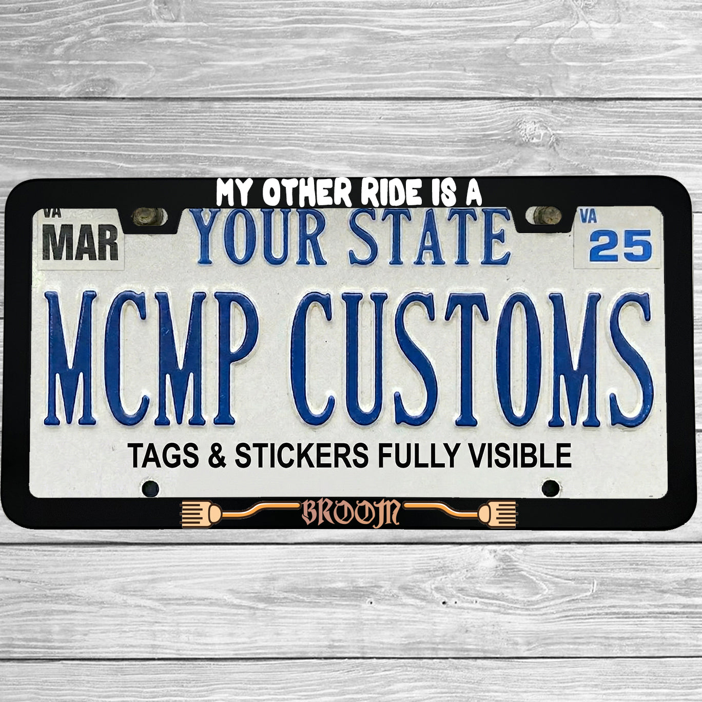 "My Other Ride Is A Broom" license plate frame shown on vehicle — lifestyle photo