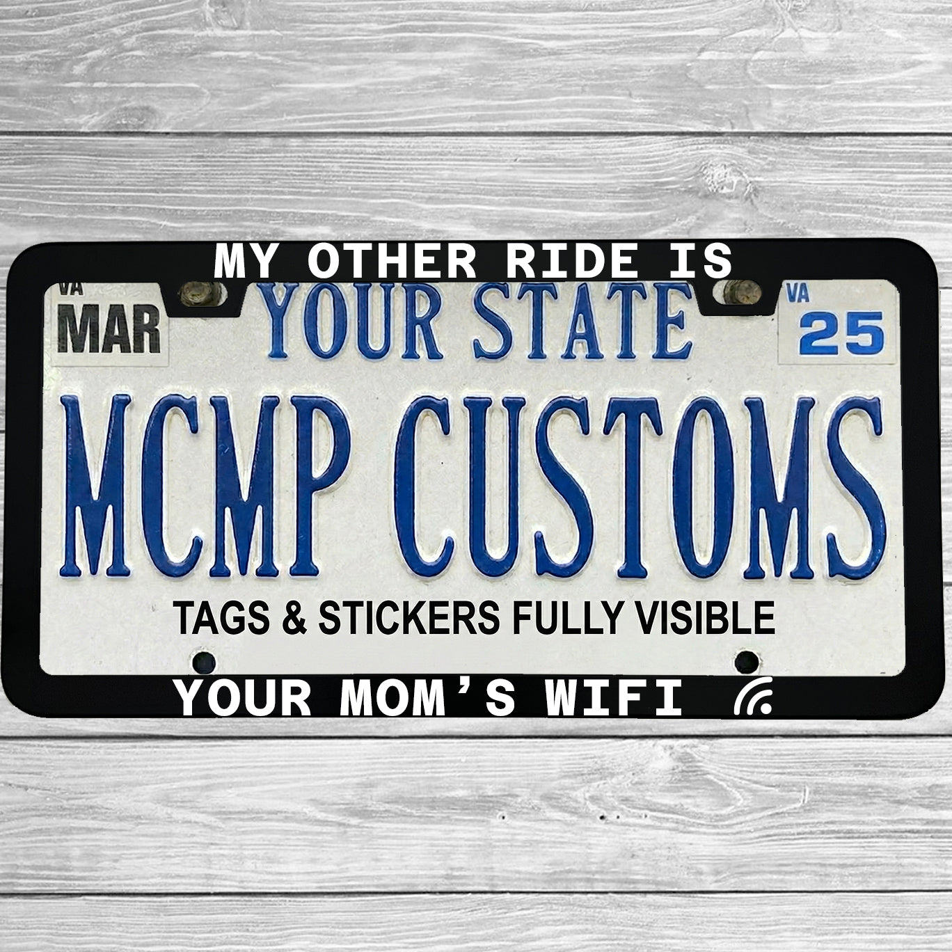 "My Other Ride Is Your Mom's Wifi" license plate frame shown on vehicle — lifestyle photo