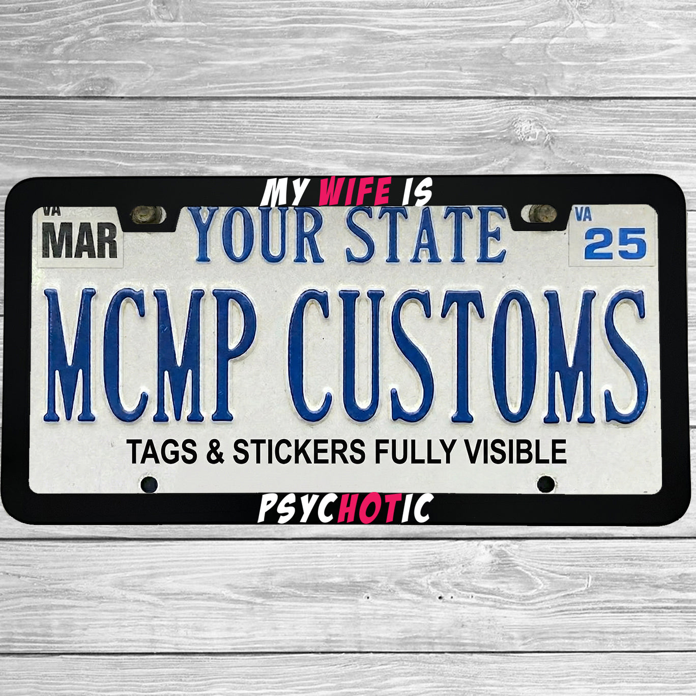 "My Wife Is Psychotic" license plate frame shown on vehicle — lifestyle photo