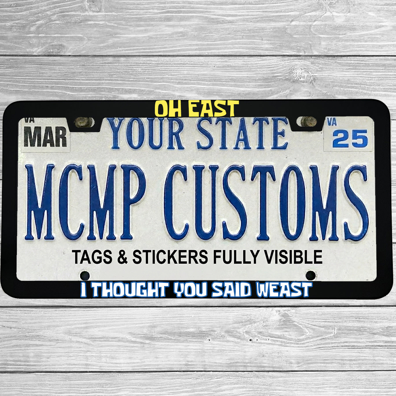 "Oh East I Thought You Said Weast" license plate frame shown on vehicle — lifestyle photo