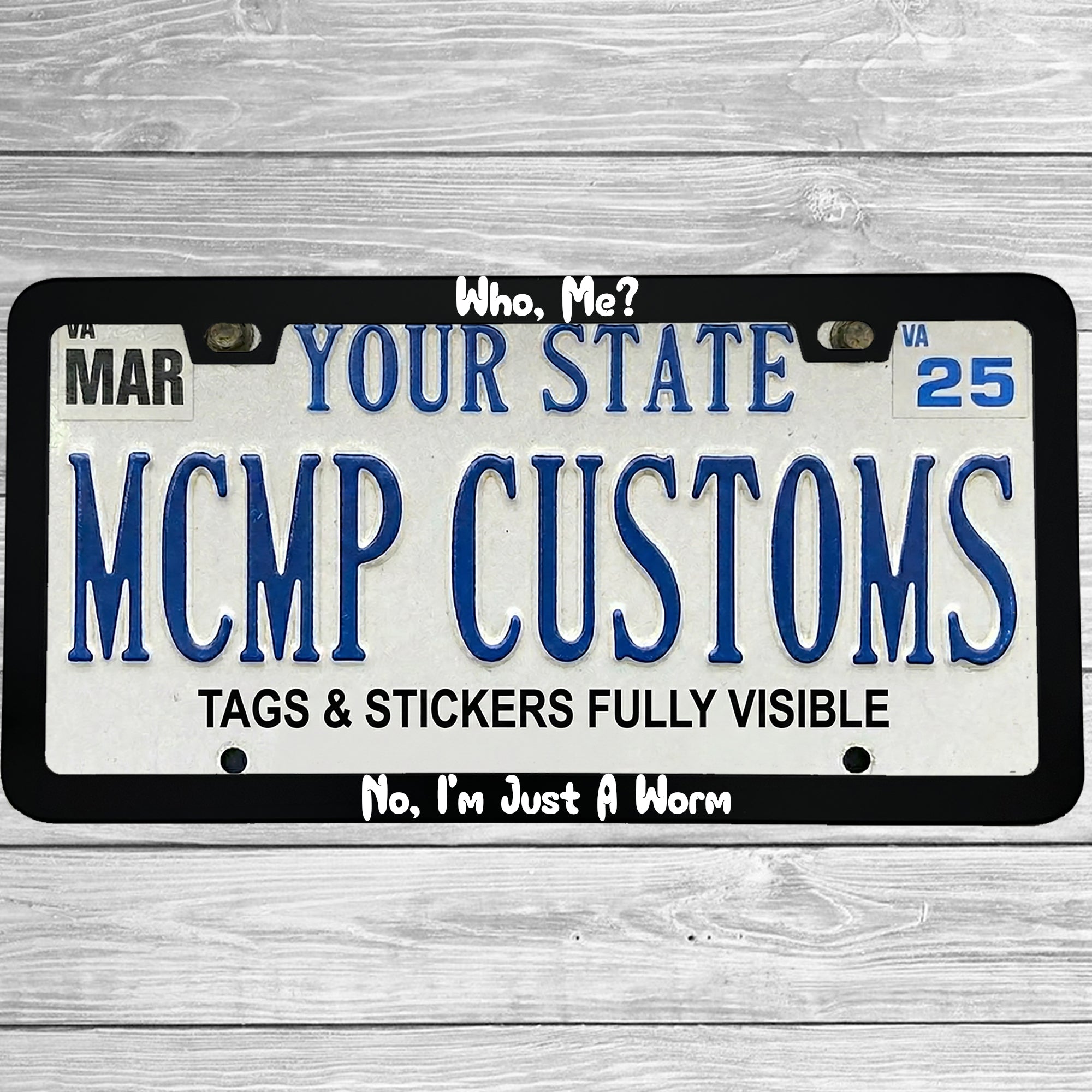 "Who, Me?  No, I'm Just A Worm" license plate frame shown on vehicle — lifestyle photo