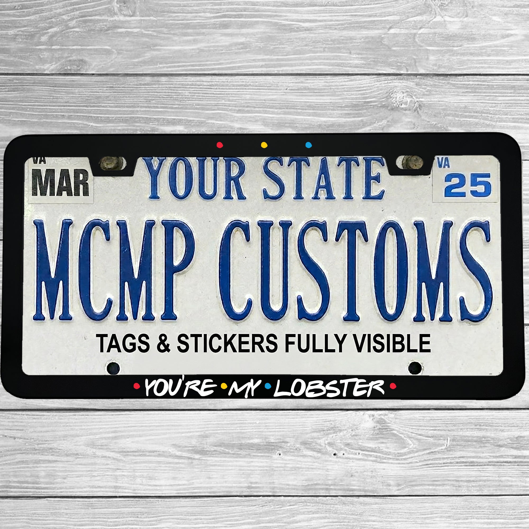 "You're My Lobster" license plate frame shown on vehicle — lifestyle photo